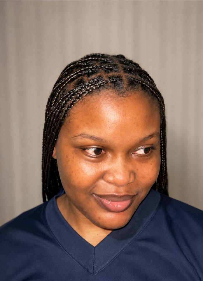 Neat straight-back braids, front view