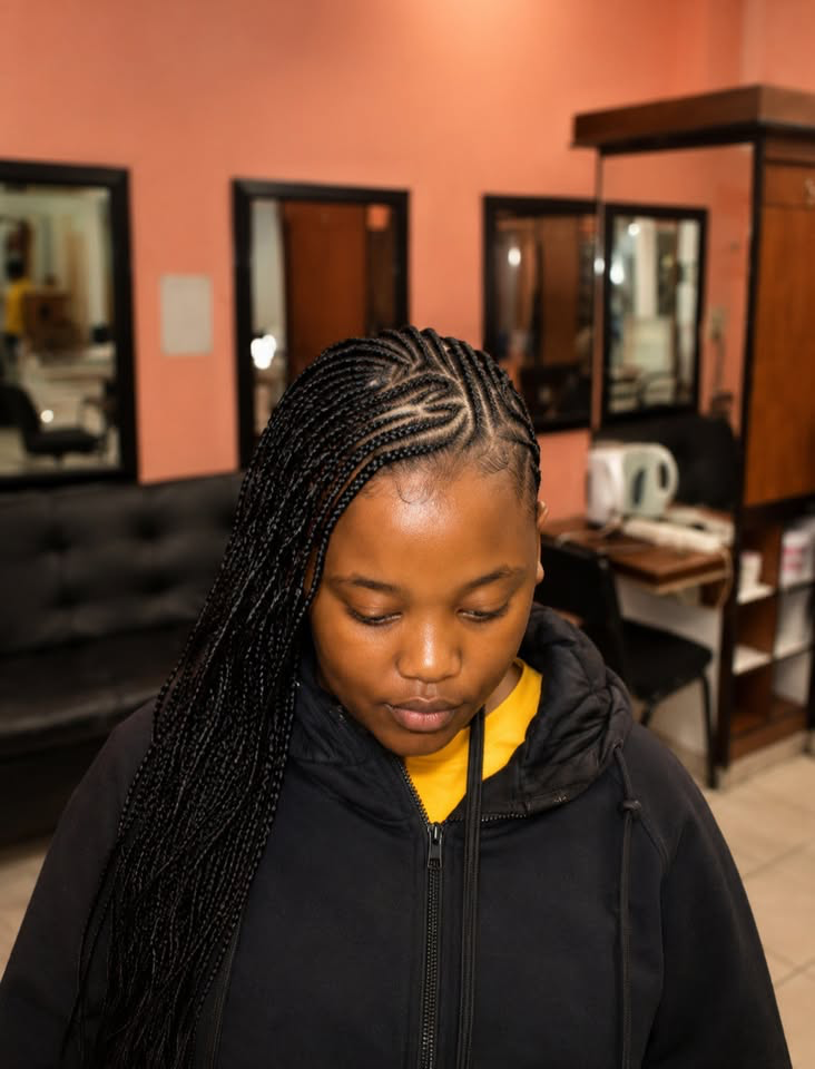 Lemonade braids cascading to one side